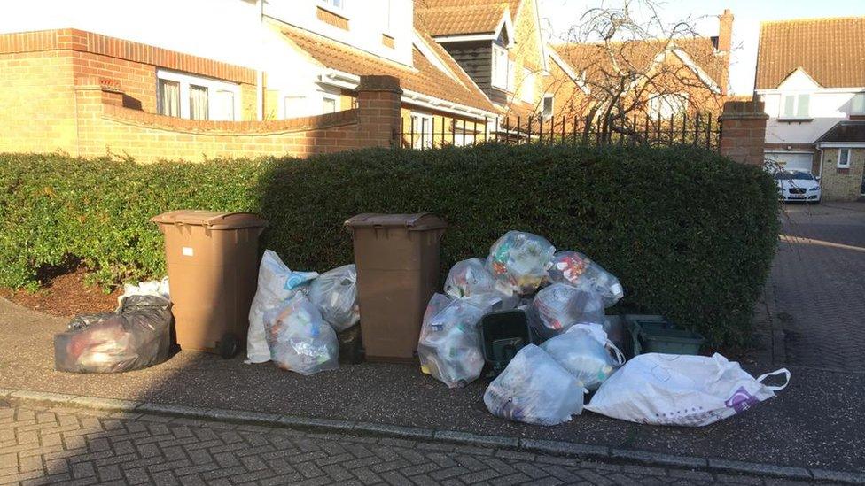 stacked up bin bags Essex