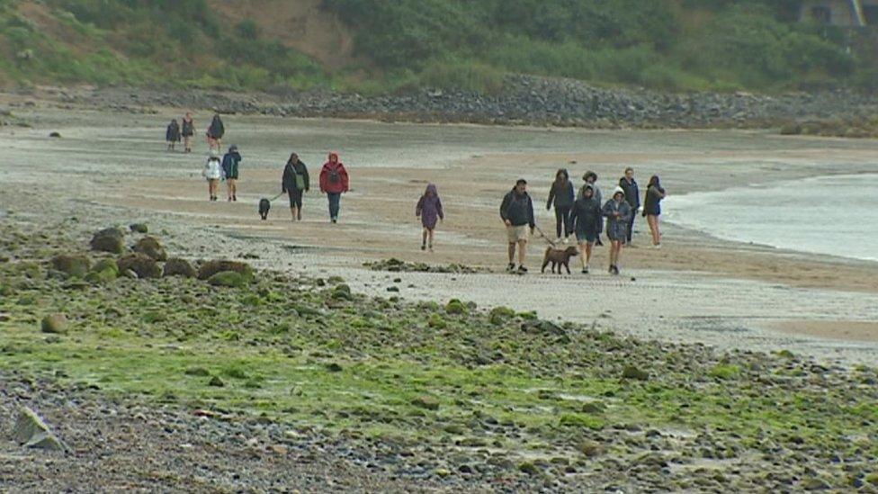 Tourists on the beach during the summer