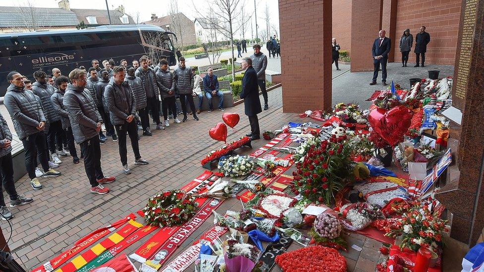 Jurgen Klopp and Liverpool players stand in tribute at the Hillsborough memorial