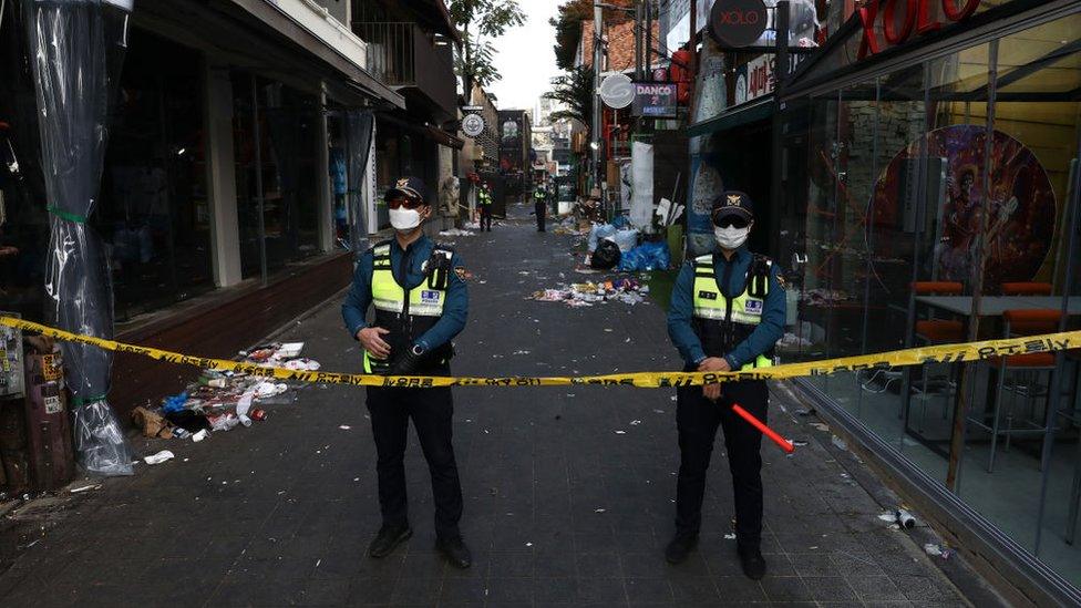 Police continued to stand guard near the scene