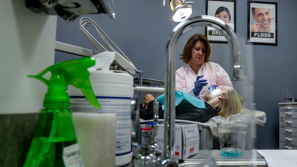 Woman receives dental care