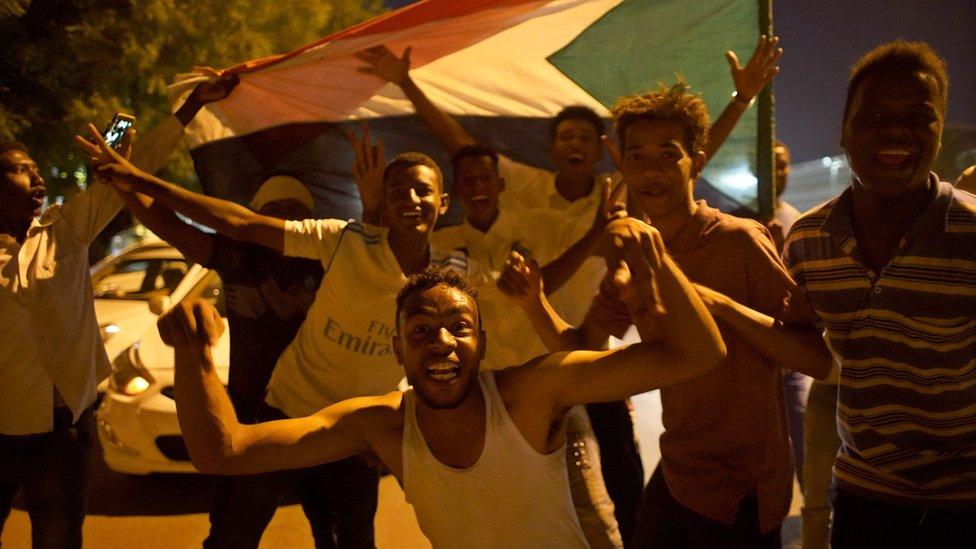 Sudanese demonstrators in Khartoum celebrating