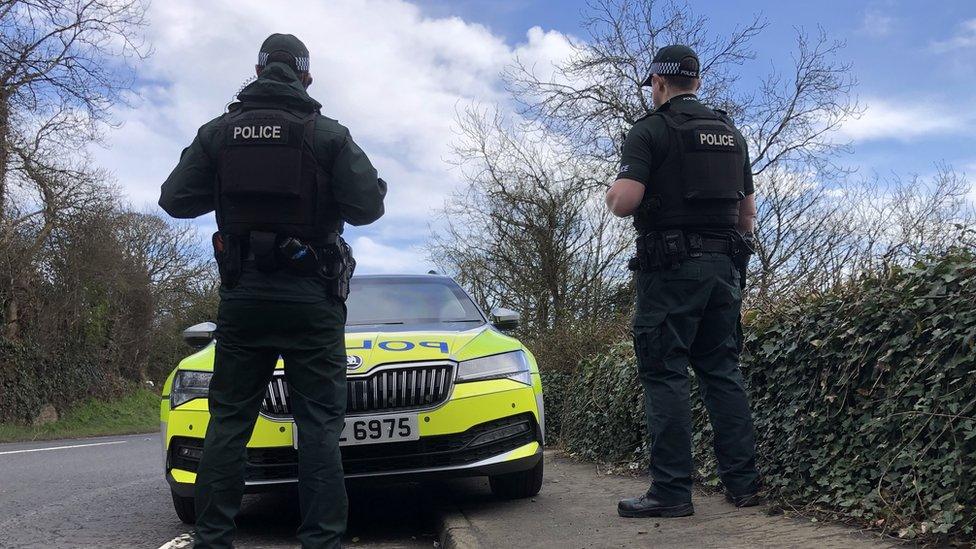 PSNI officers and car