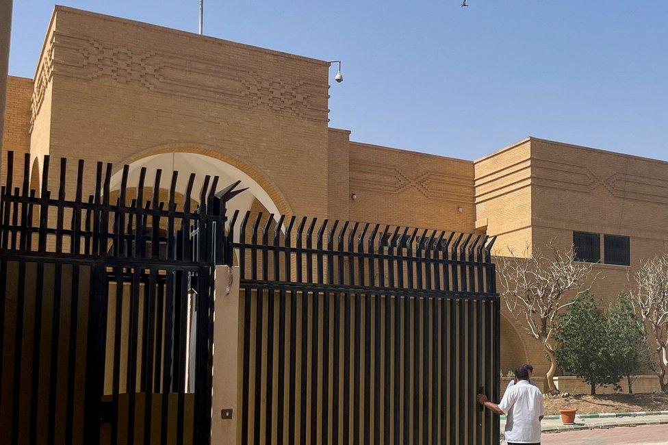 File photo showing people standing outside the Iranian embassy in Riyadh, Saudi Arabia (12 April 2023)