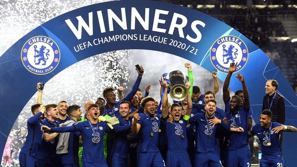 Chelsea players lift the Champions League trophy