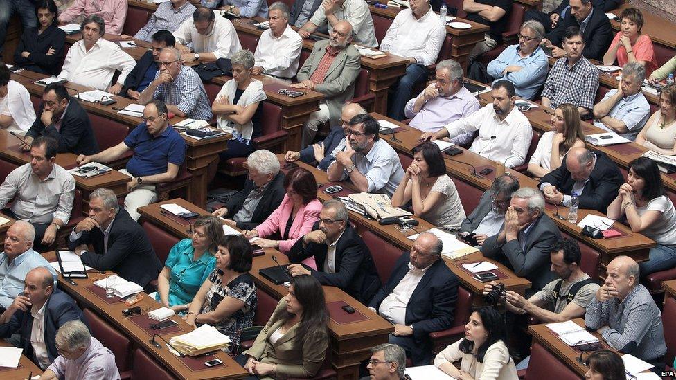 Syriza's lawmakers attend a party meeting in the Greek Parliament in Athens on 16 June