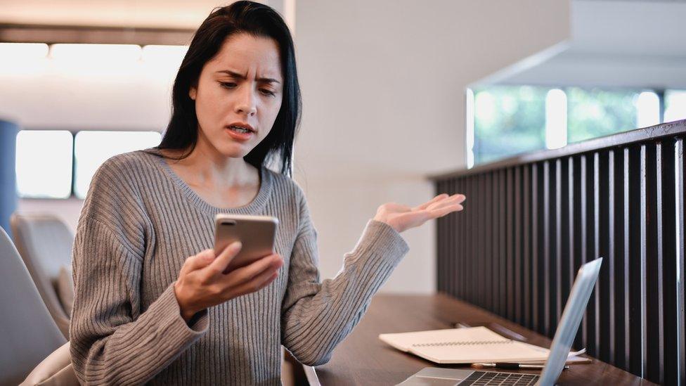 Woman using mobile phone