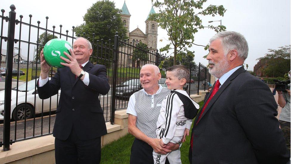 Martin McGuinness attended a community celebration marking the replacement of the Ardoyne peace wall