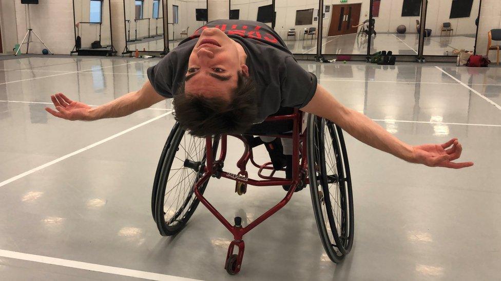 Joe Powell-Main dancing in his wheelchair