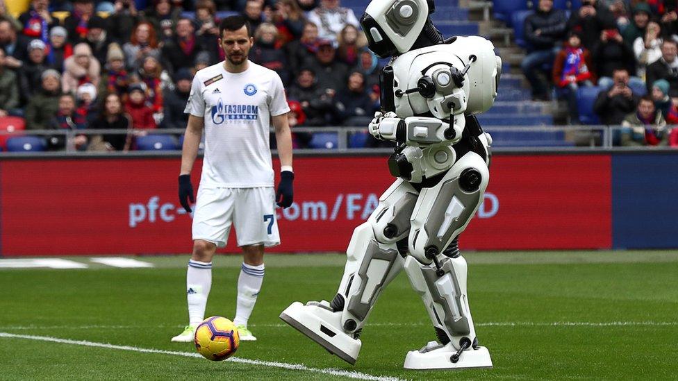 Robot Alyosha playing football