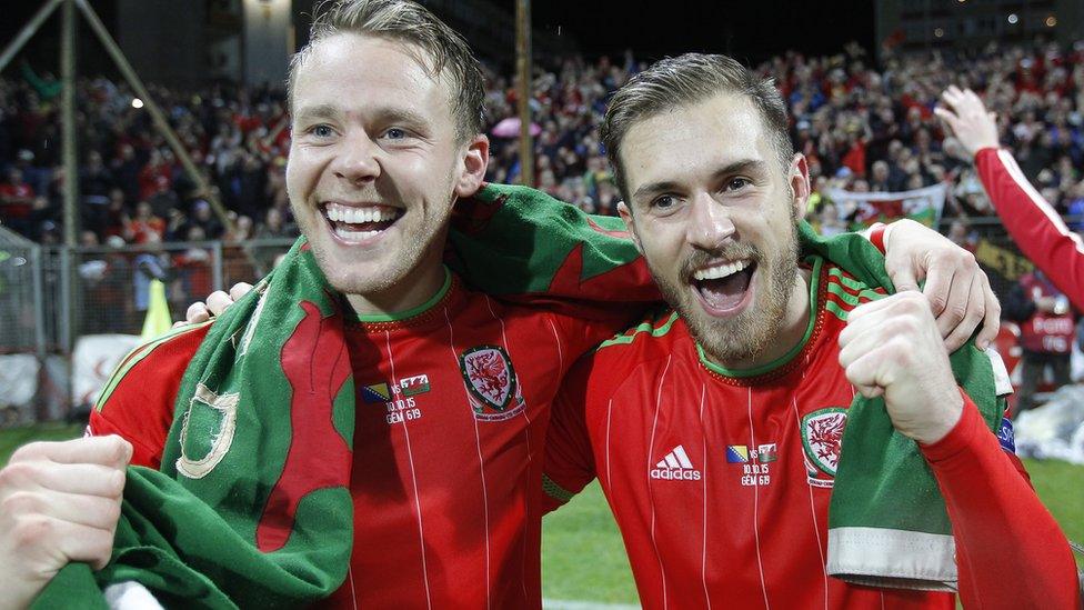 Chris Gunter (l) and Aaron Ramsey celebrate after the match