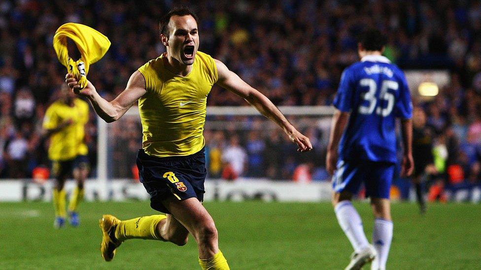 Iniesta scores.
