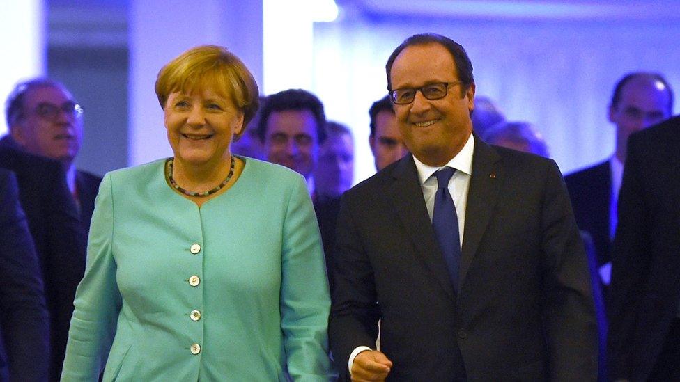 French President Francois Hollande (R) and German Chancellor Angela Merkel