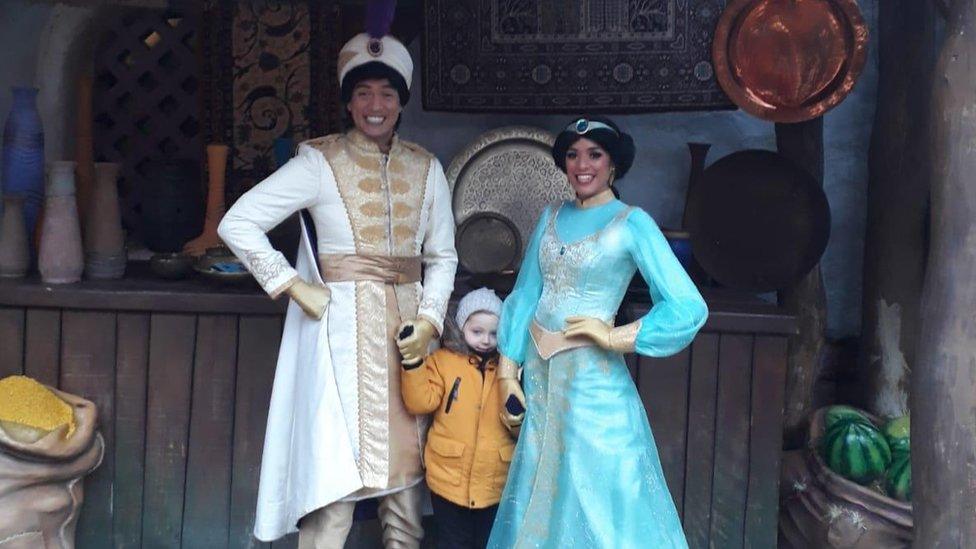 Aladdin and Jasmine with boy