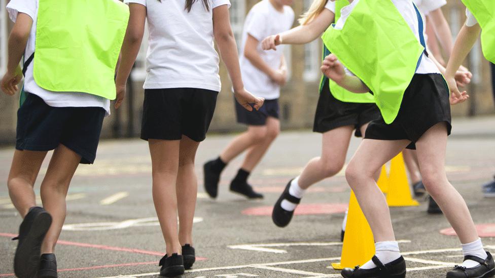 Children running in the playground