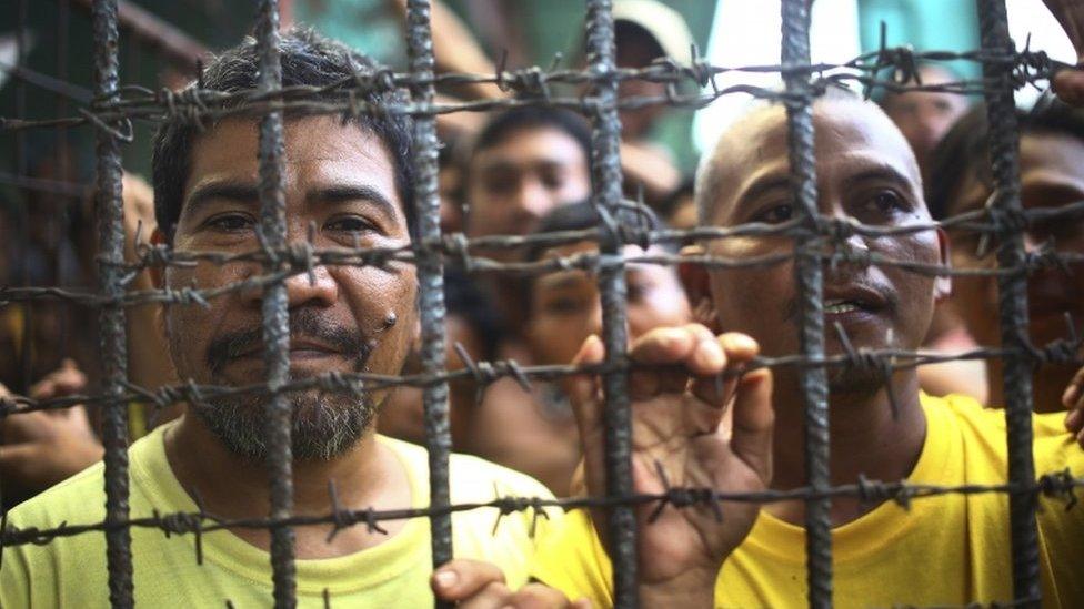 Filipino inmates pictured in their cell at the North Cotabato District Jail in Kidapawan city, Philippines, on 4 January 2017 after a massive jailbreak.