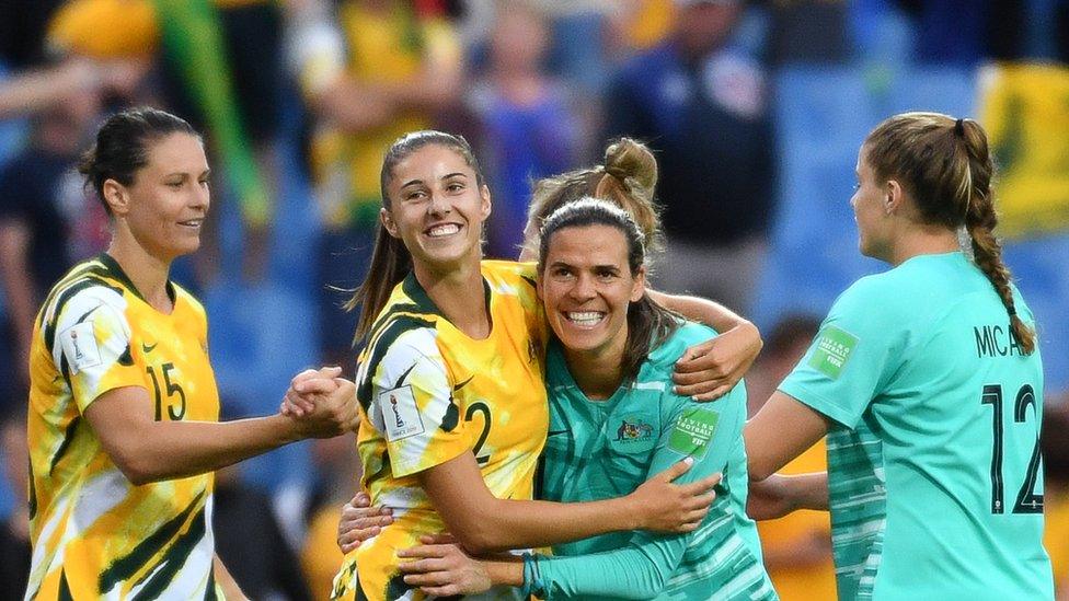 Australia's-players-celebrate-after-winning-against-brazil-fifa-world-cup.