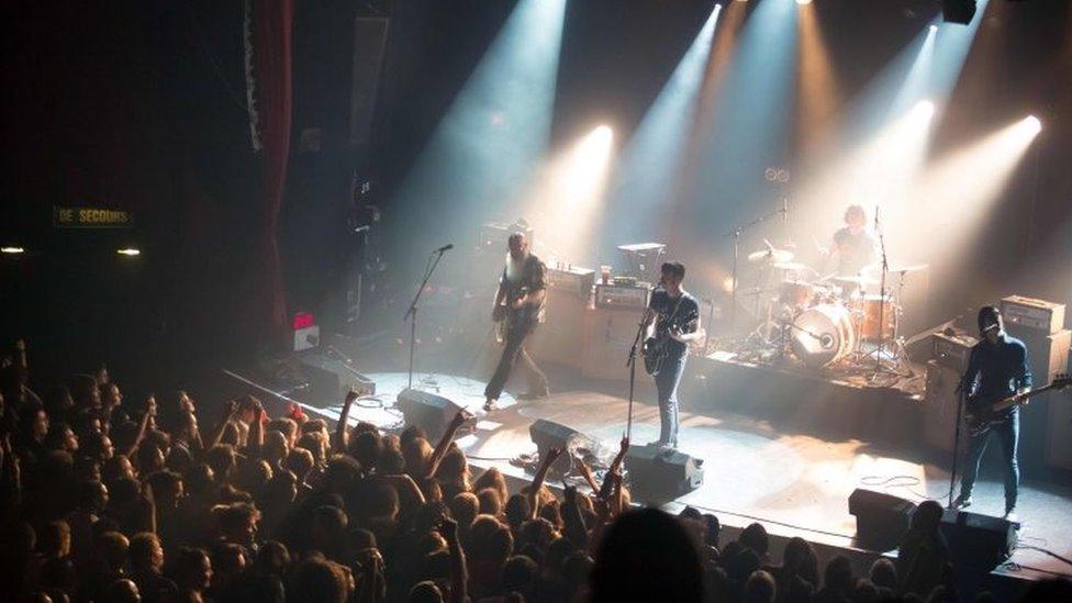 US band Eagles of Death Metal performing on stage on November 13, 2015