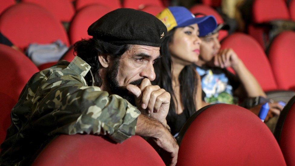 Humberto Lopez, known as "El Che", reacts as National Electoral Council (CNE) President Tibisay Lucena announces the official results of parliamentary elections in Caracas, December 7, 2015