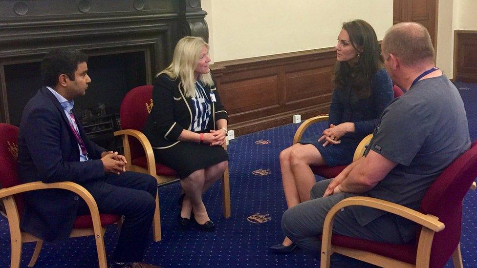 Duchess of Cambridge talking to hospital staff