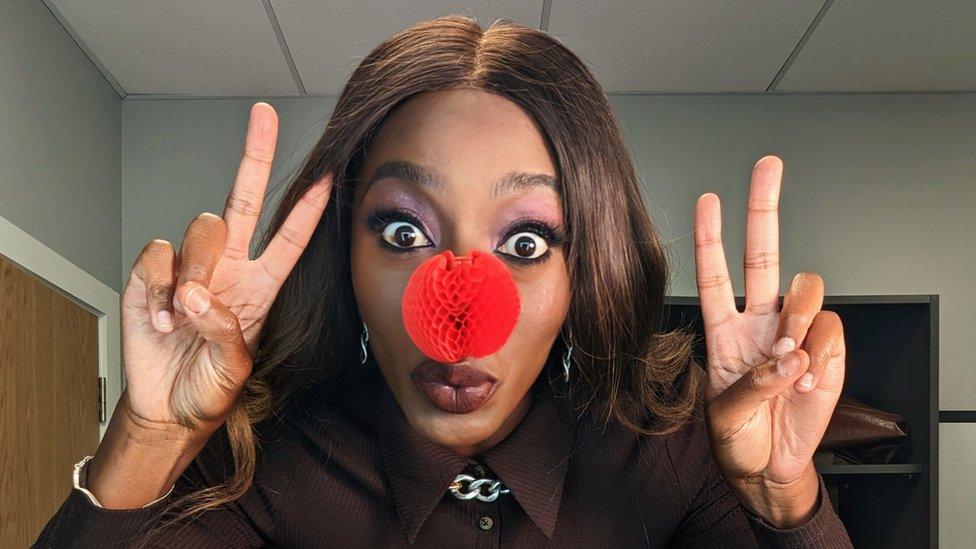 AJ Odudu in her red nose