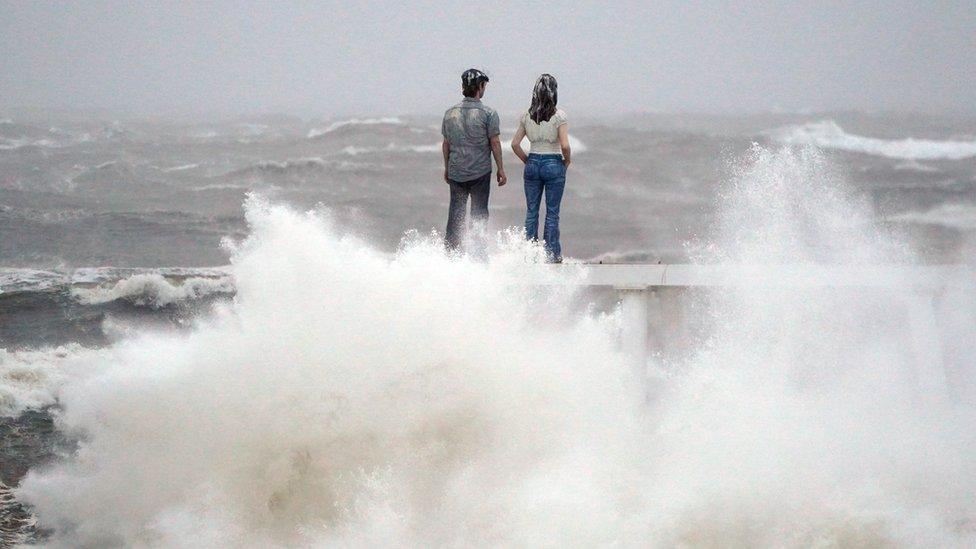 The sculpture "The Couple" by Sean Henry at Newbiggin-by-the-Sea on the Northumberland coast