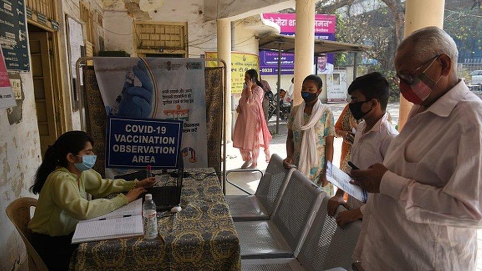 A Covid-19 vaccine registration desk in Karol Bagh, New Delhi