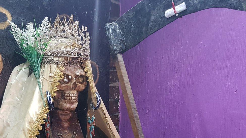 A Santa Muerte statue in the temple in Guadalajara