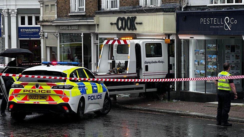 The recovery truck in the front of a shop in Bishop's Stortford, Hertfordshire