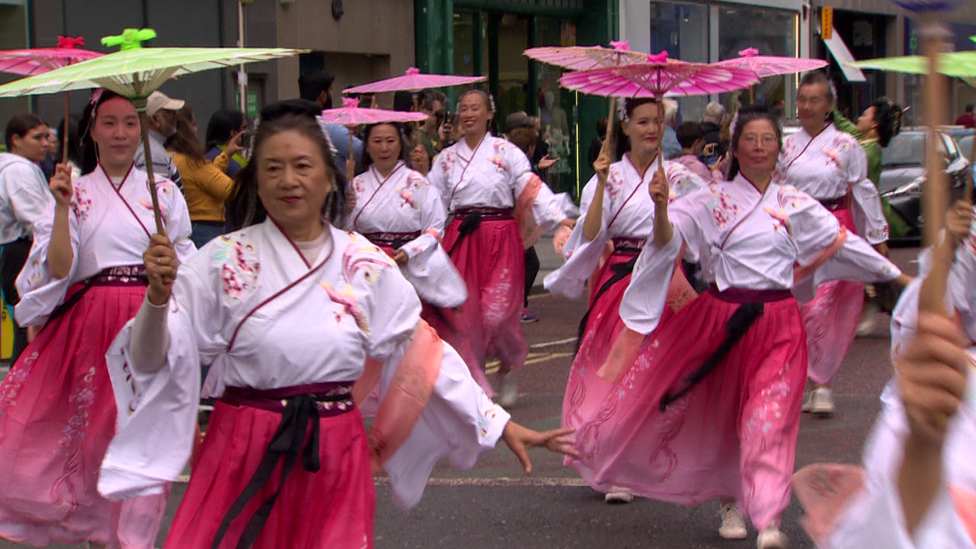 women wearing trDITIONAL DRESS