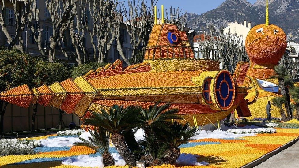 Sculpture made from oranges and lemons.