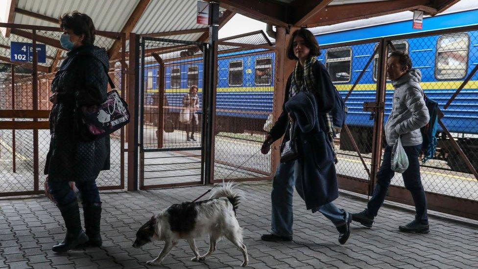 Passengers arrived on a train from Ukraine to the railway station in Przemysl, Poland