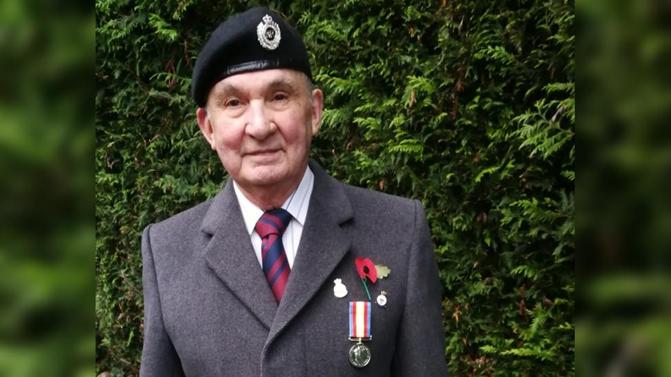 Gordon Craggs wearing his beret and nuclear test medal