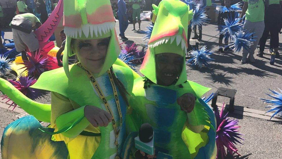 These girls dressed up as dinosaurs as part of their Carnival parade.