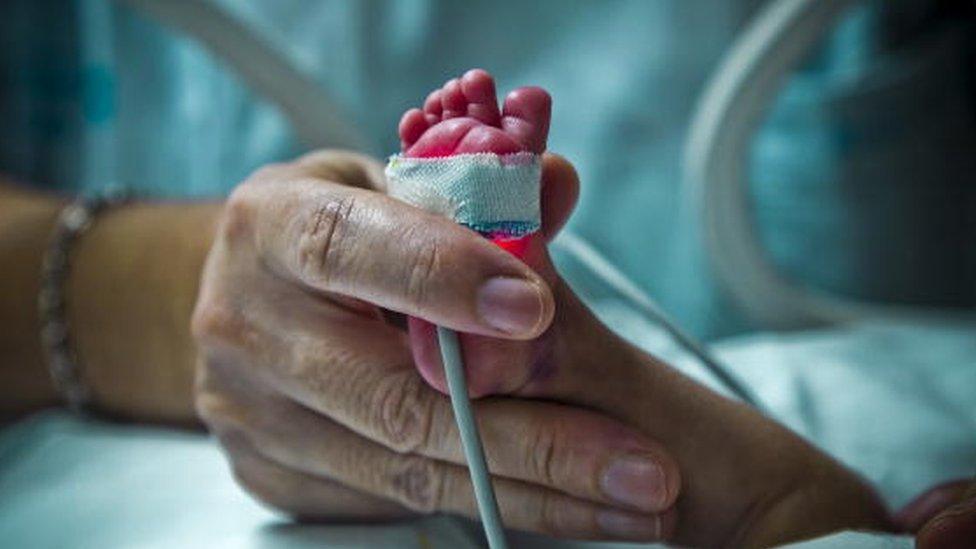 A baby in an incubator at a hospital in Madrid