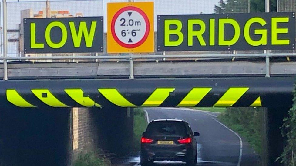 Markings on a low bridge