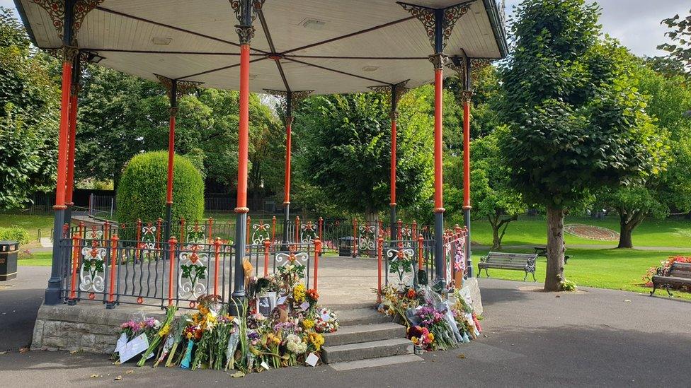 Flowers placed around the bandstand at Dorchester's Borough Gardens