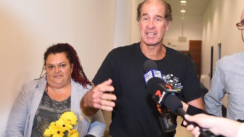 Roxanne Holmes and James Ricketson speaking to media after their arrival at Sydney Airport