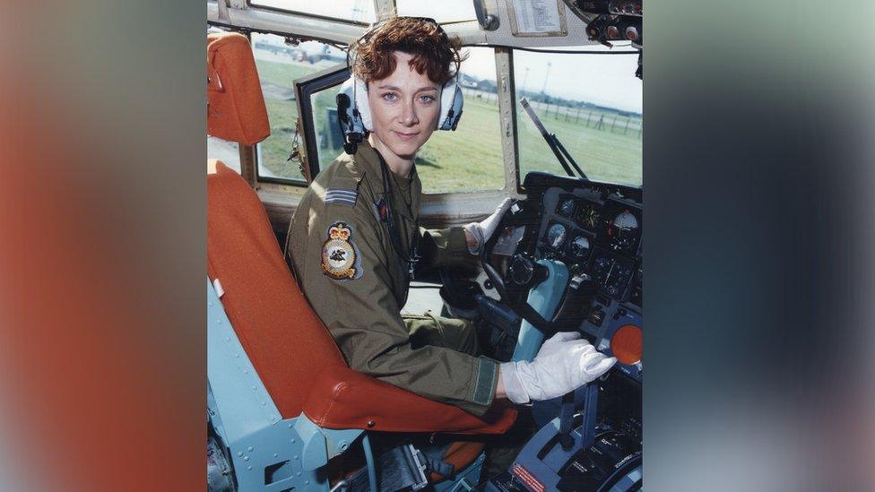 Julie in a plane cockpit