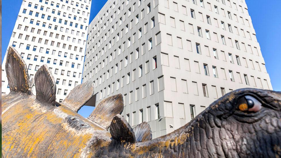 Dinosaur statute outside Ibis hotel in Santa Coloma de Gramenet