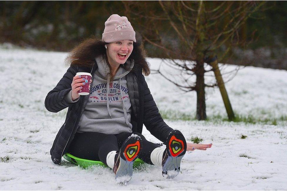 woman sledding