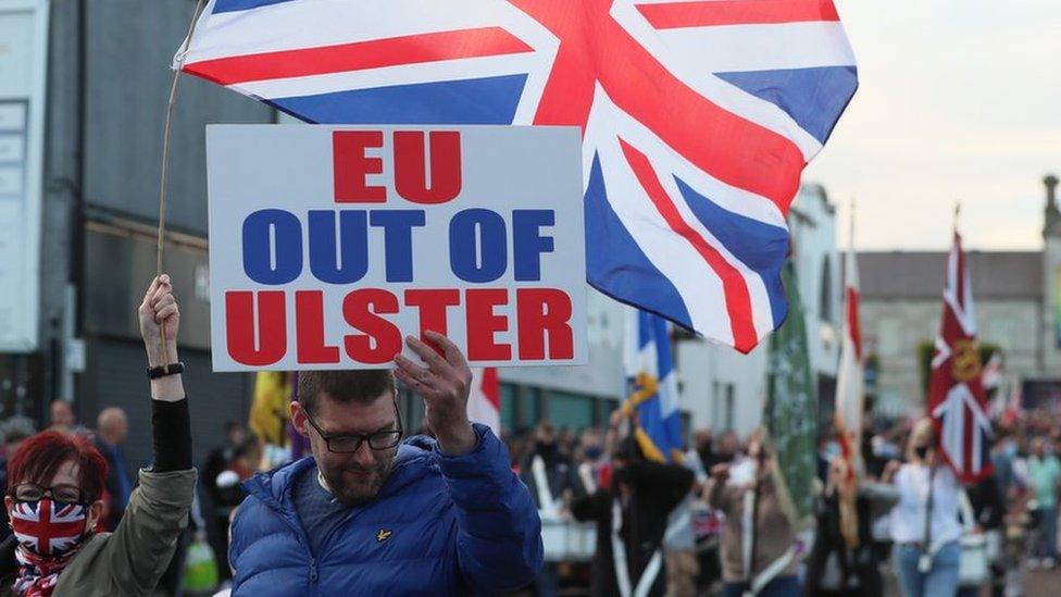 People take part in a Loyalist protest in Newtownards, County Down, against the Northern Ireland Protocol