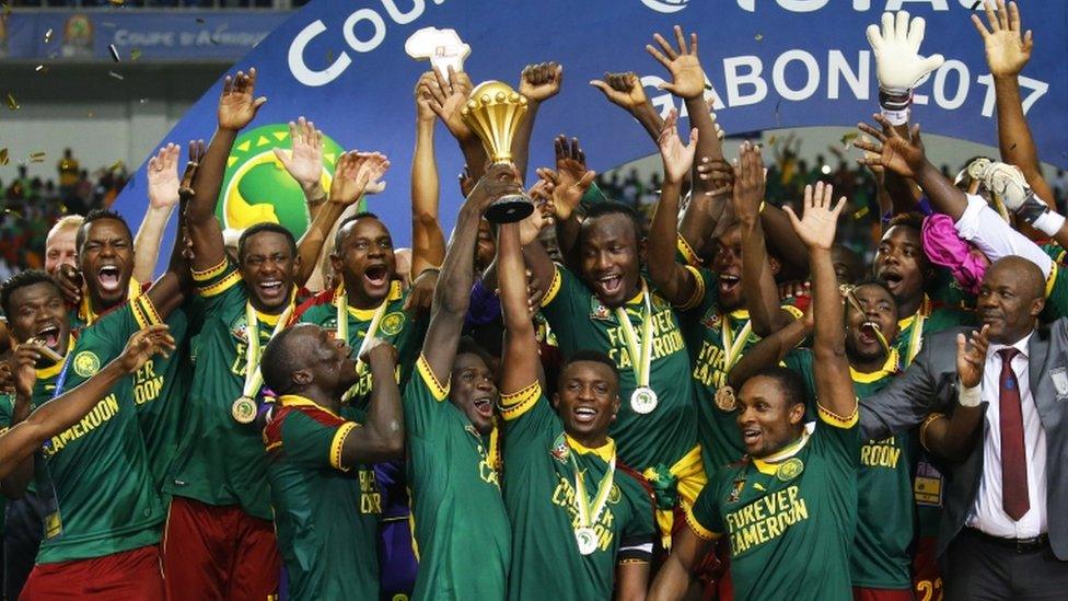 Cameroon's players celebrate winning the Africa Cup of Nations