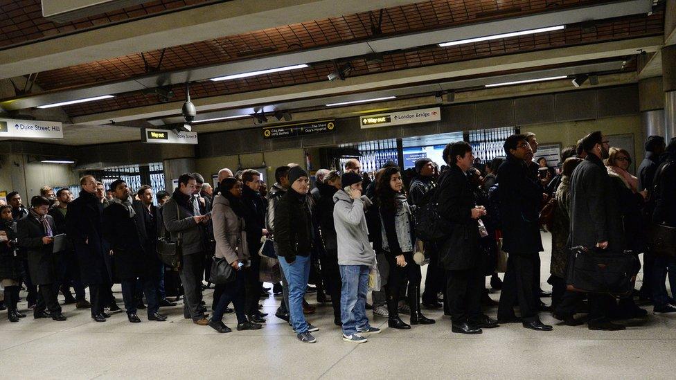 Commuters at London Bridge Underground Station due to strike on London Underground caused gridlock