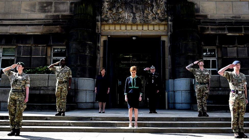 First Minister Nicola Sturgeon observed the two-minute silence in Edinburgh