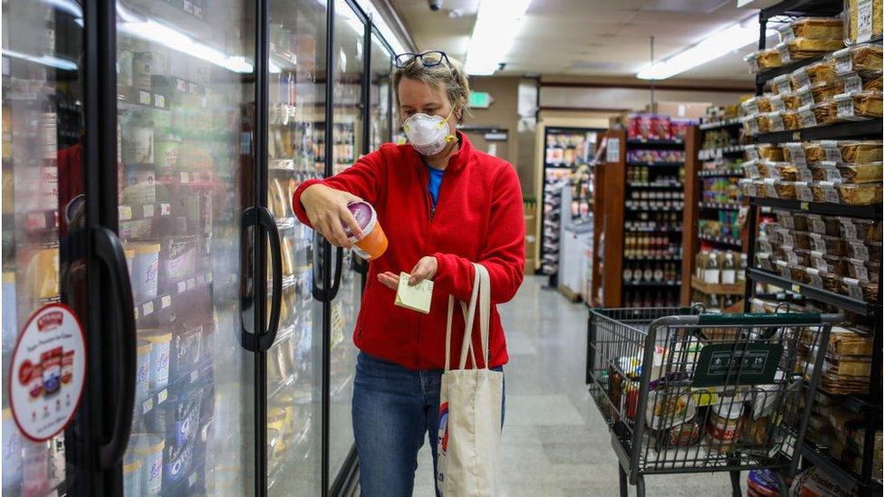 Woman shops for groceries