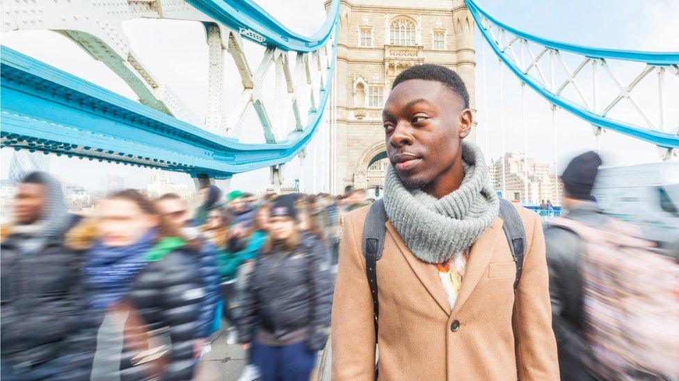 young man on Tower Bridge