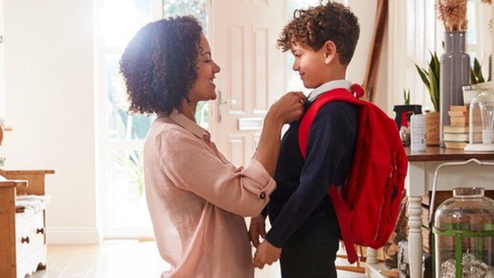 Child getting ready for school