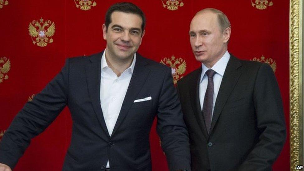 Russian President Vladimir Putin, right, and Greek Prime Minister Alexis Tsipras attend a signing ceremony in the Kremlin in Moscow, Russia