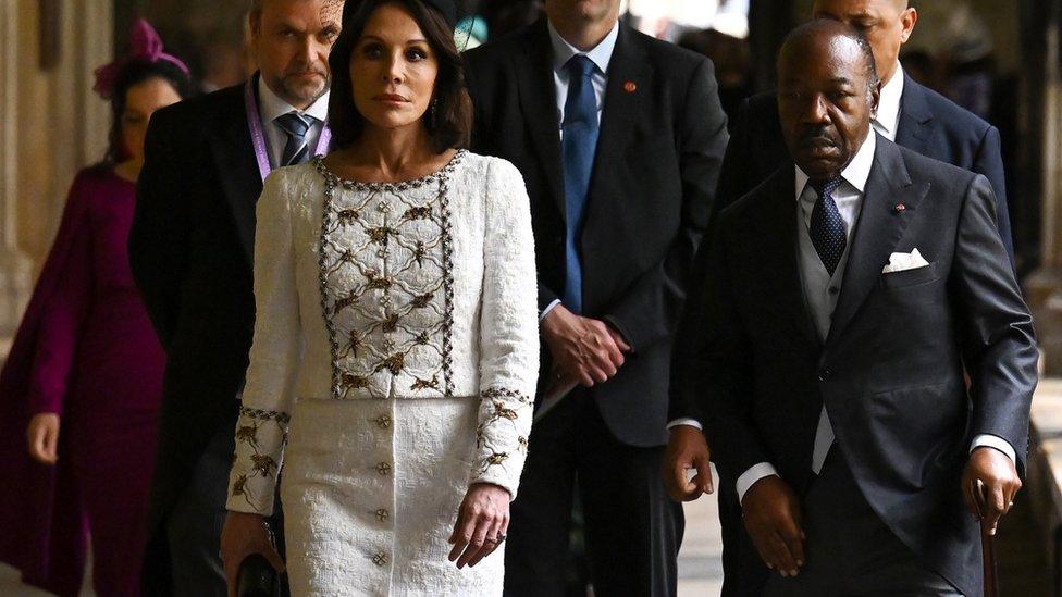 Gabonese President Ali Bongo Ondimba and wife Sylvia Bongo Ondimba arrive to take their seats ahead of the Coronation of King Charles III and Queen Camilla in May 2023.